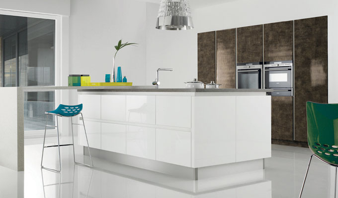 Handleless white gloss and bronze offers excellent storage solutions 